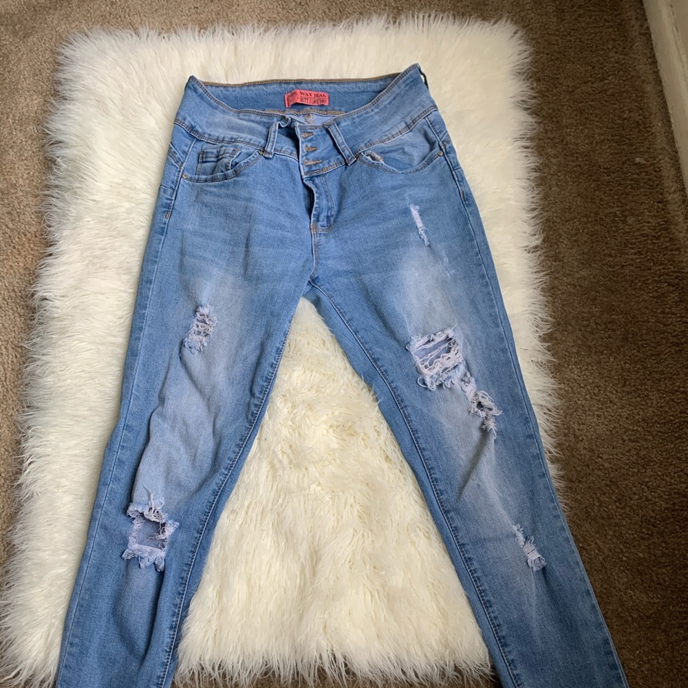 Distressed light washed jeans